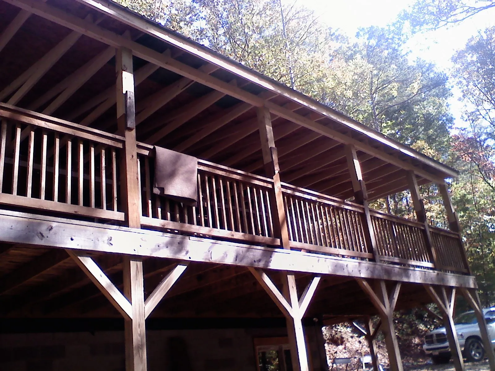 Timber framing under a new elevated porch and deck — Roof Leak Repair in South Otselic by Roofing Brothers